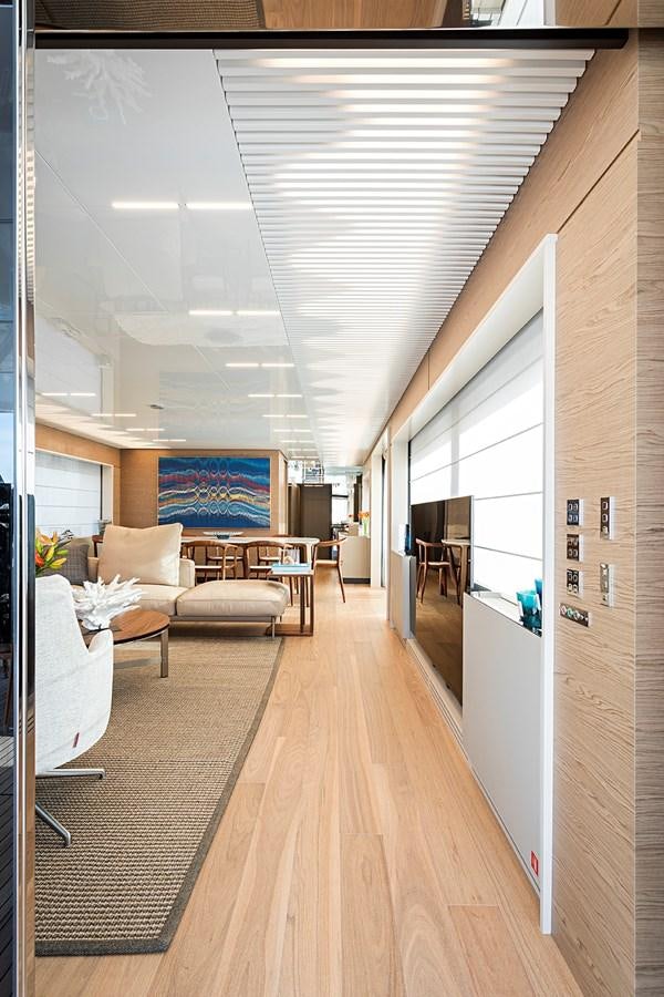 a room with a couch and a table and chairs aboard ANINHA 1 Yacht for Sale