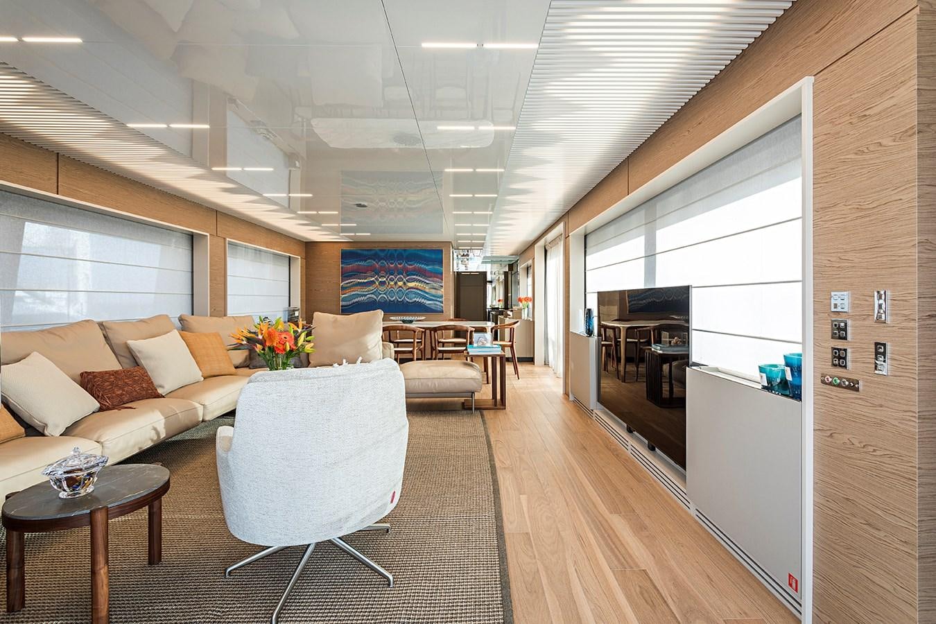 a living room with a couch and a table aboard ANINHA 1 Yacht for Sale