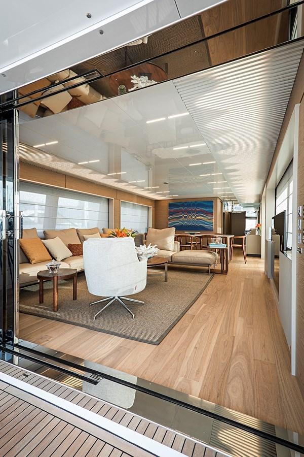a room with a couch and a table aboard ANINHA 1 Yacht for Sale
