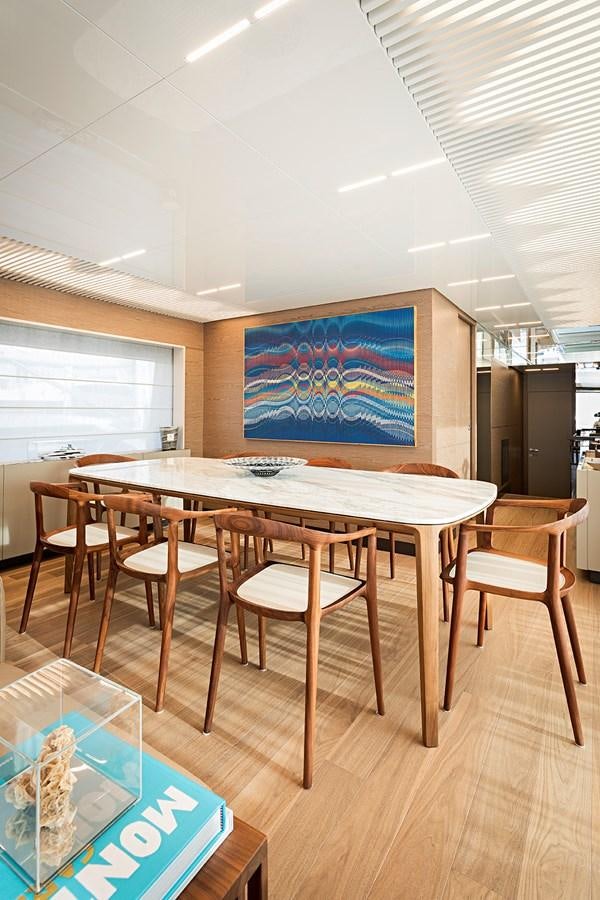 a table and chairs in a room aboard ANINHA 1 Yacht for Sale