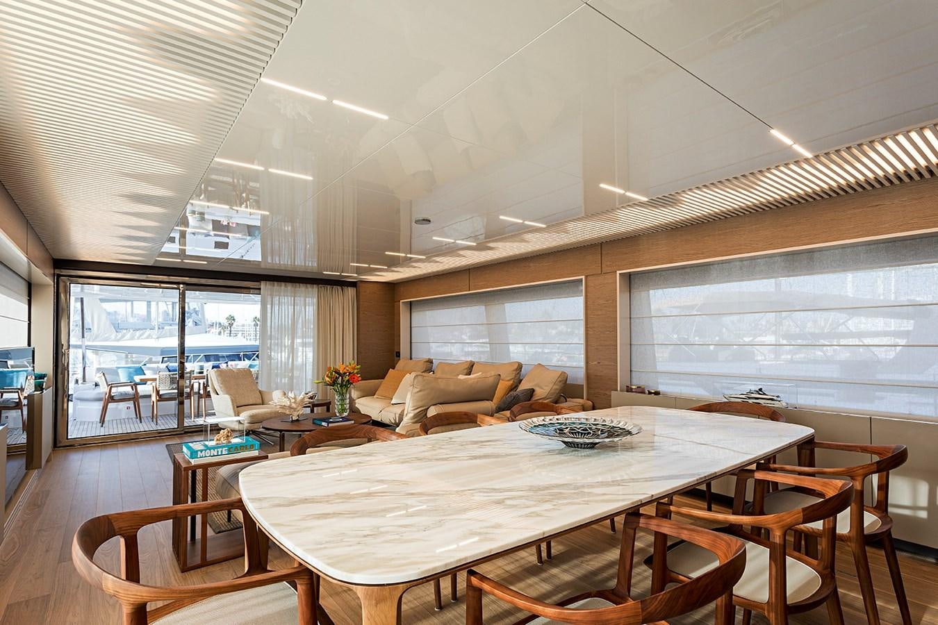 a room with a table and chairs aboard ANINHA 1 Yacht for Sale