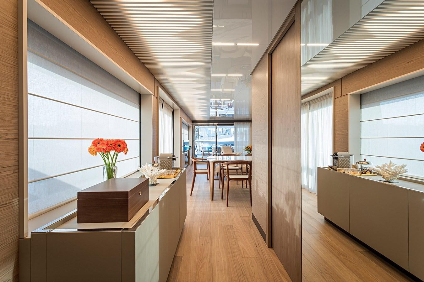 a room with a table and chairs aboard ANINHA 1 Yacht for Sale