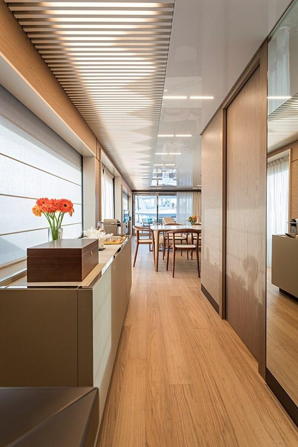 a room with a counter and chairs aboard ANINHA 1 Yacht for Sale