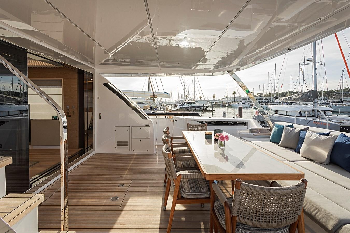 a boat with a table and chairs aboard ANINHA 1 Yacht for Sale