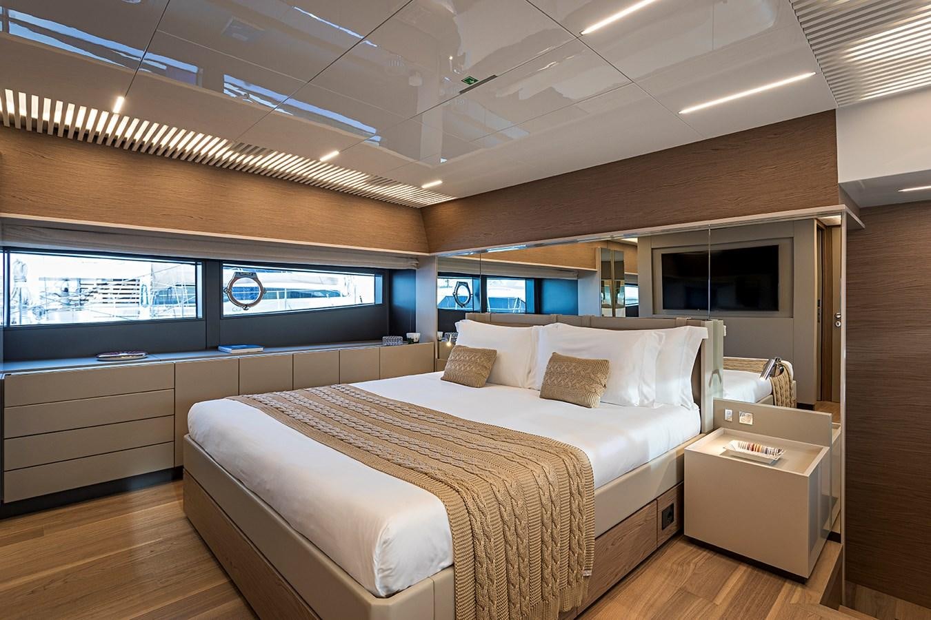 a room with a bed and a window aboard ANINHA 1 Yacht for Sale