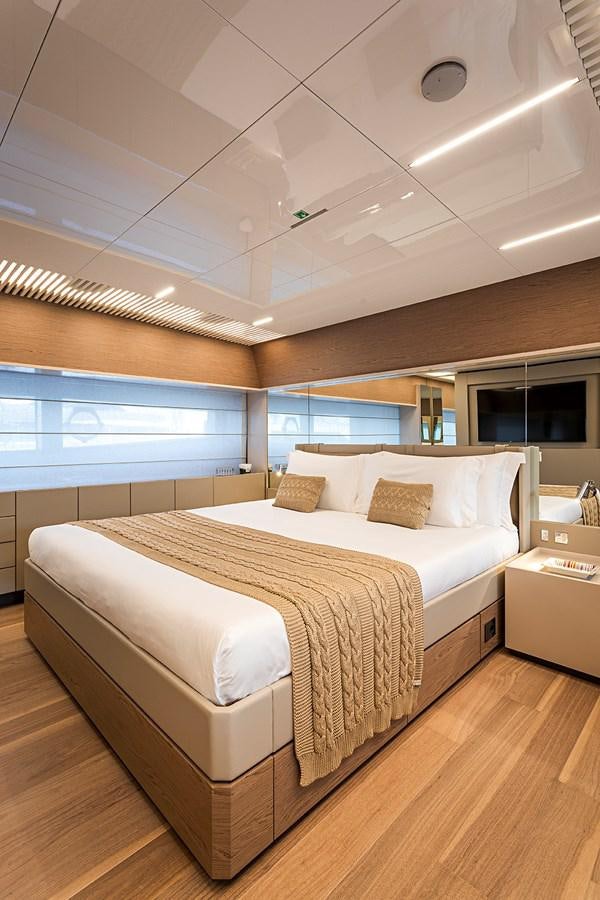 a large bed in a room aboard ANINHA 1 Yacht for Sale