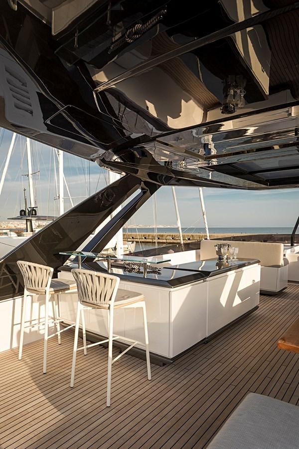 a room with a table and chairs aboard ANINHA 1 Yacht for Sale