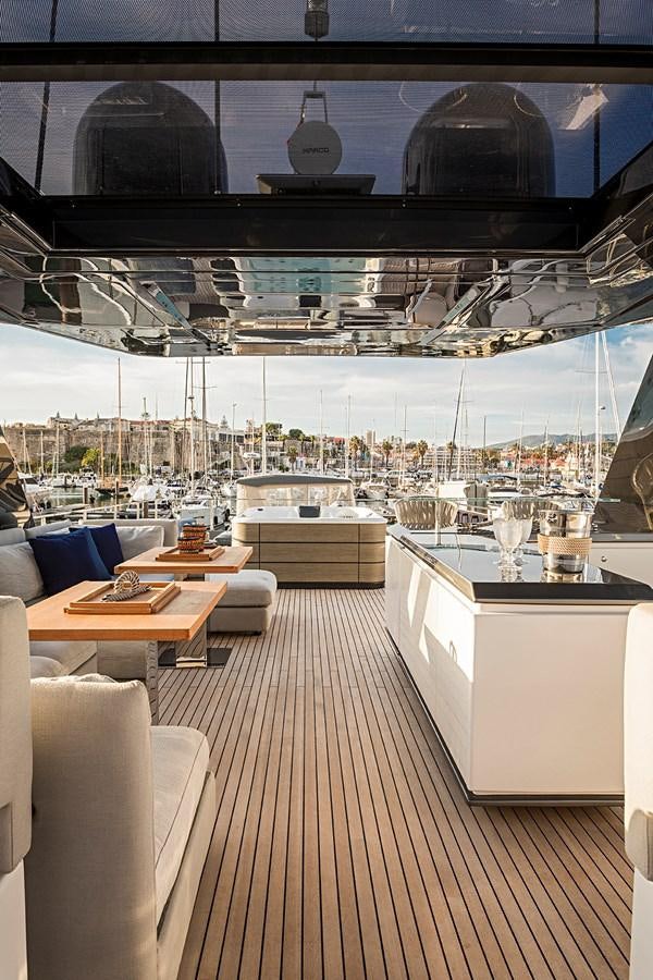 a room with a table and chairs aboard ANINHA 1 Yacht for Sale