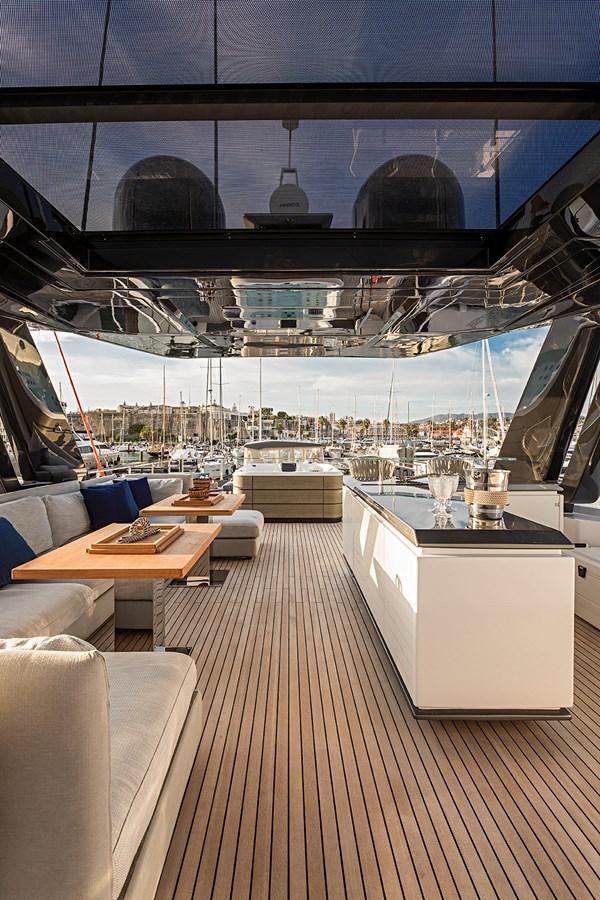 a room with a view of a city and a large window aboard ANINHA 1 Yacht for Sale