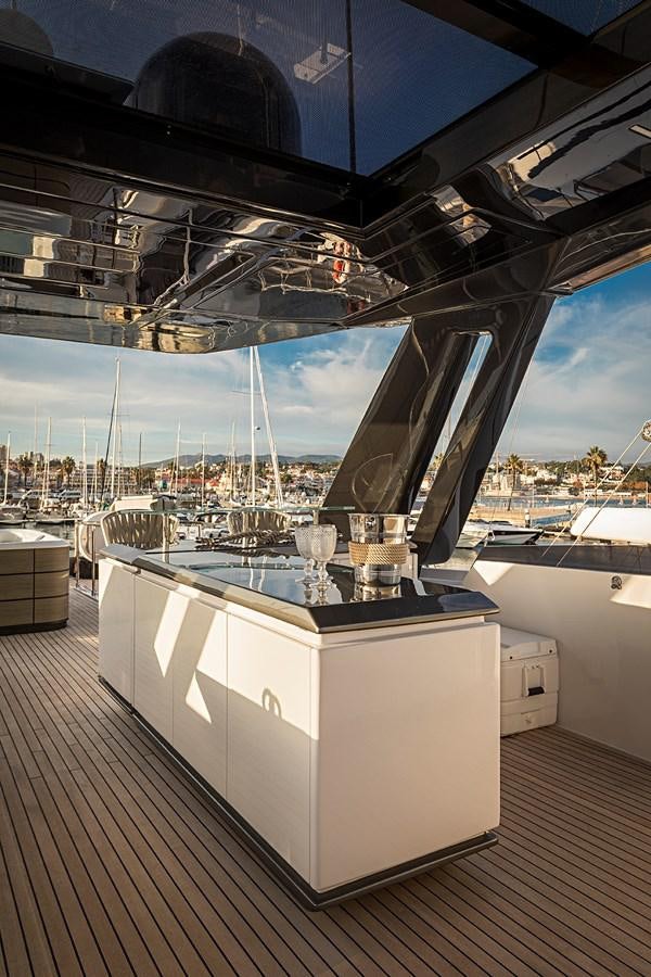 a large glass building with a large glass window aboard ANINHA 1 Yacht for Sale