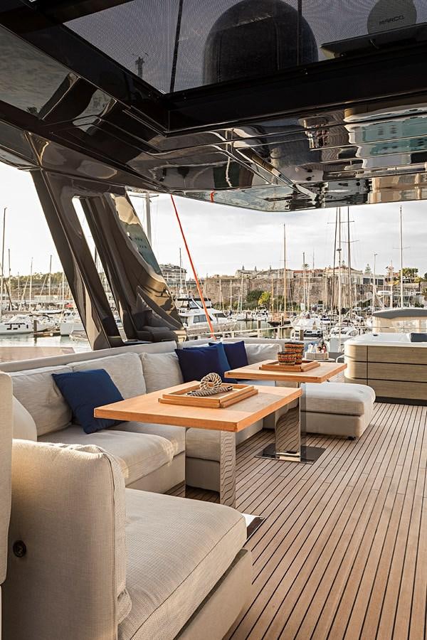 a room with a table and chairs aboard ANINHA 1 Yacht for Sale