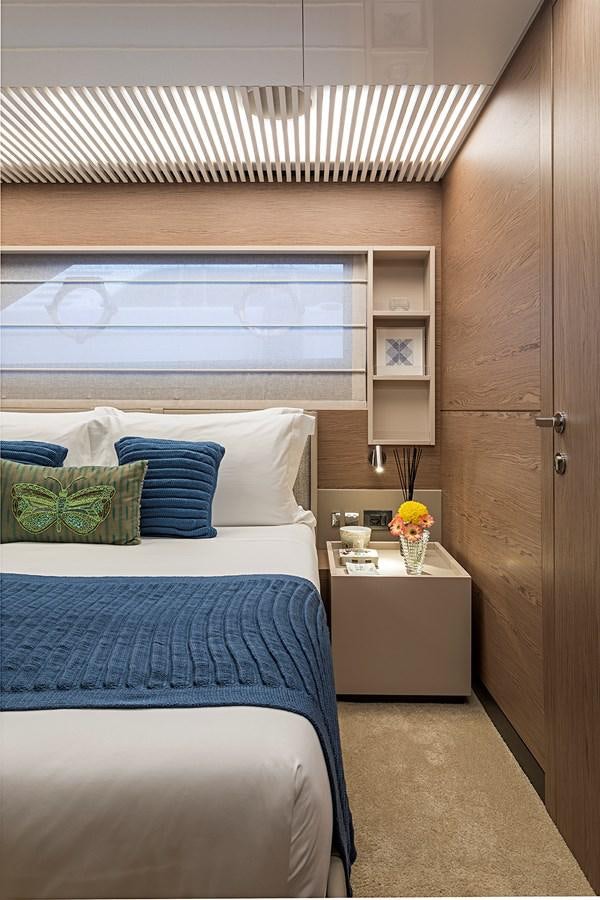 a room with a bed and a desk aboard ANINHA 1 Yacht for Sale
