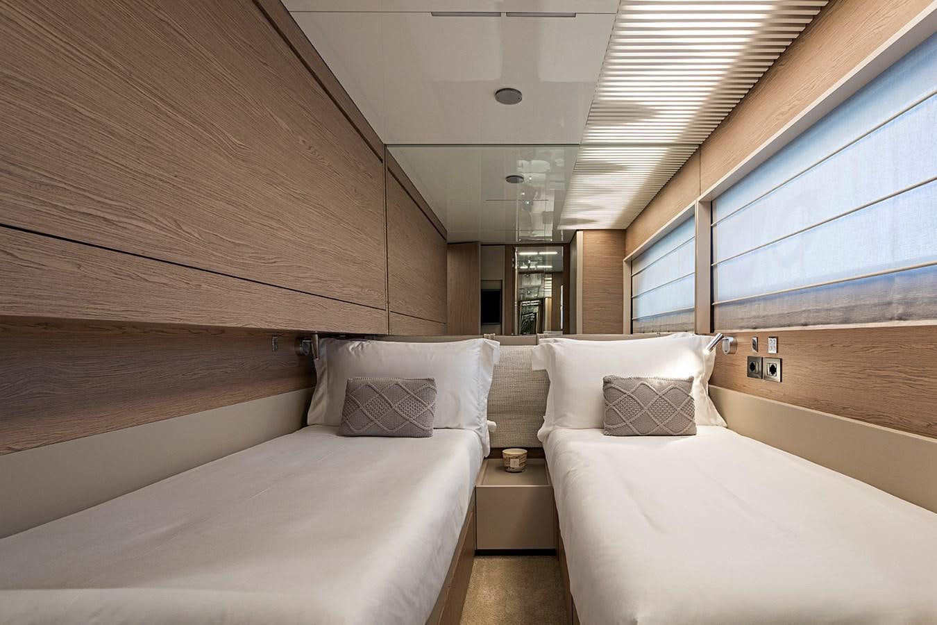 a room with two beds aboard ANINHA 1 Yacht for Sale
