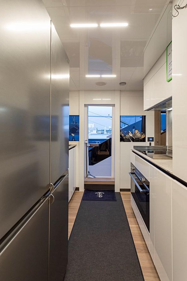 a hallway with a glass door aboard ANINHA 1 Yacht for Sale