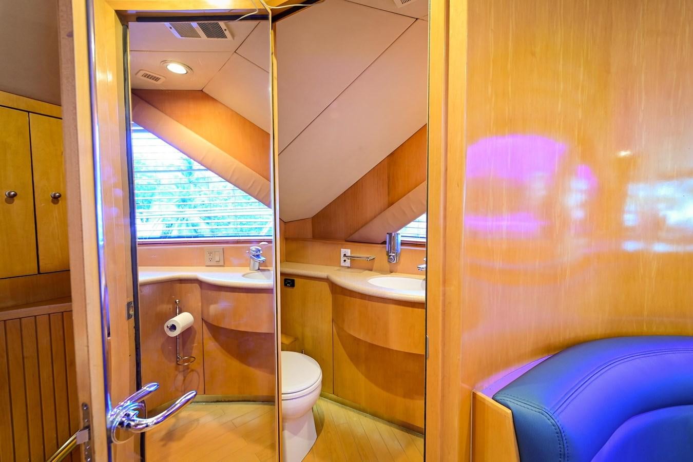 a bathroom with a tub sink and toilet aboard MAHA Yacht for Sale