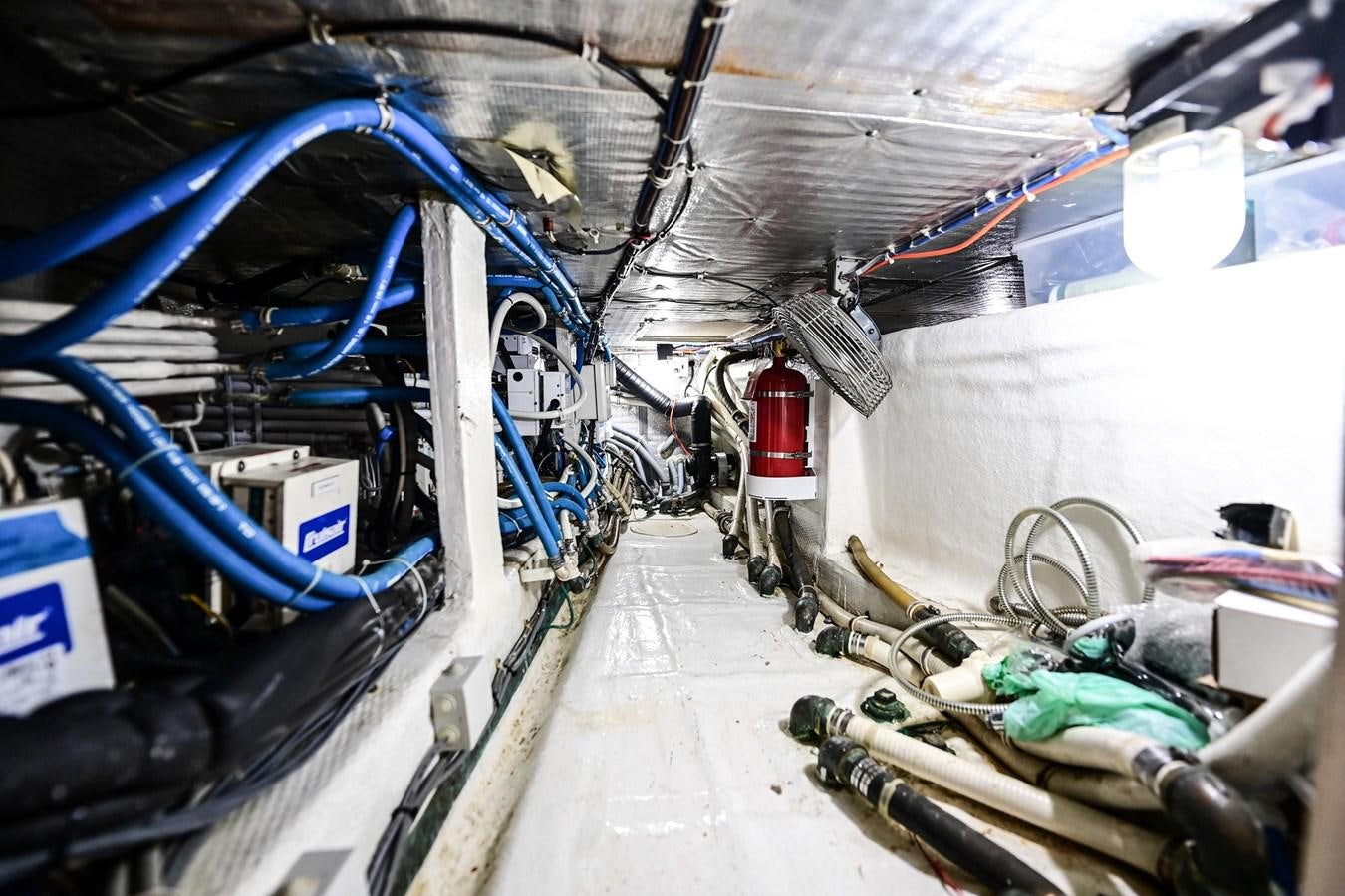 a car with a large blue wheel aboard MAHA Yacht for Sale