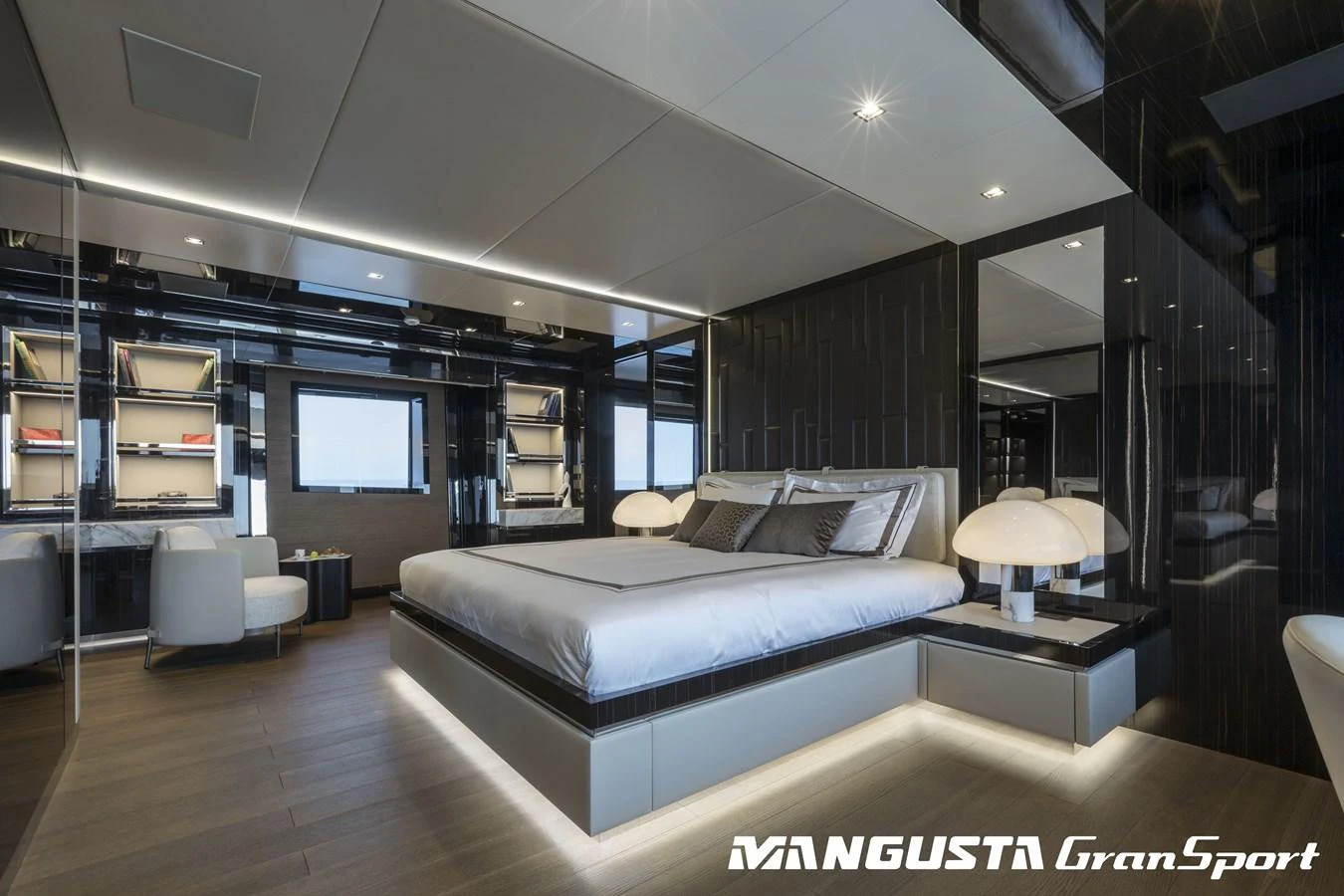 a room with a bed and a tv aboard RR Yacht for Sale