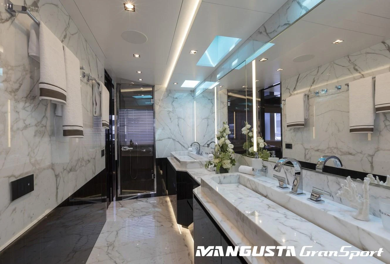 a bathroom with a large tub aboard RR Yacht for Sale