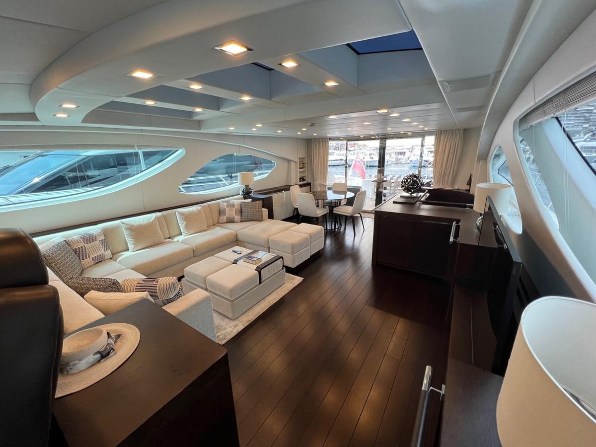 a room with a large pool aboard MANGUSTA MAXIOPEN 94#2 - MISS BUBBLES - CAREFULLY USED Yacht for Sale