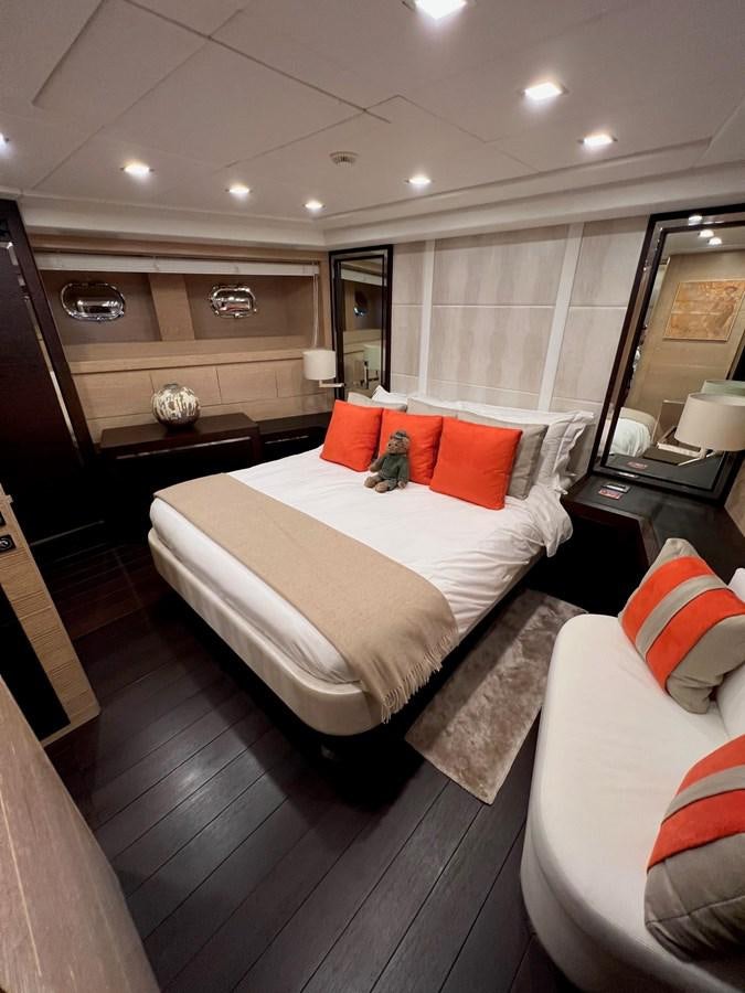a room with a bed and a mirror aboard MANGUSTA MAXIOPEN 94#2 - MISS BUBBLES - CAREFULLY USED Yacht for Sale