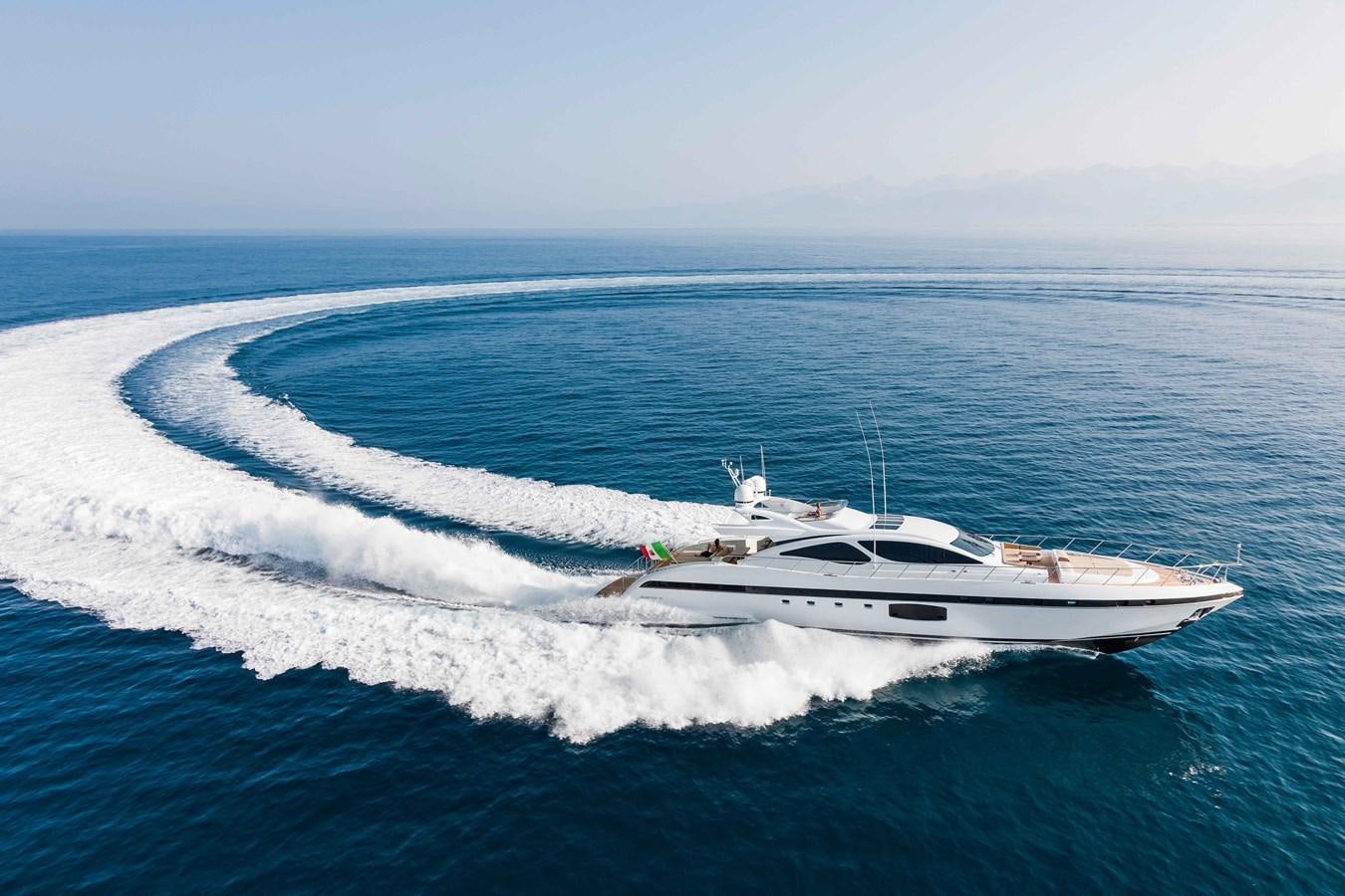 a boat on the water aboard MANGUSTA MAXIOPEN 94#2 - MISS BUBBLES - CAREFULLY USED Yacht for Sale