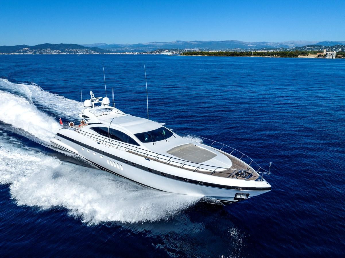 a white yacht on the water aboard CLAUDIA'S Yacht for Sale