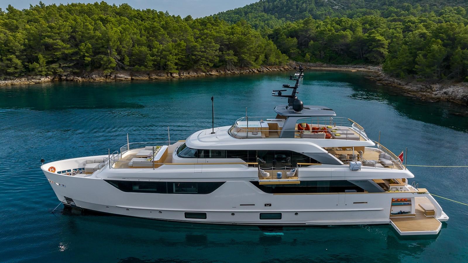 a white yacht on the water aboard EROS Yacht for Sale