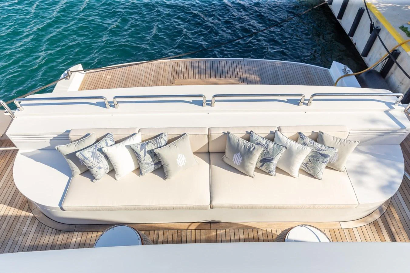 a white boat with white text aboard N.M.N Yacht for Sale
