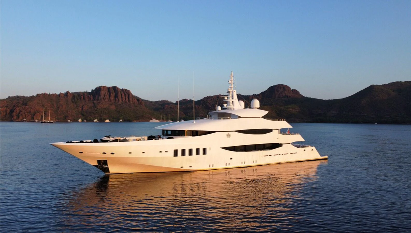 a white yacht in the water aboard N.M.N Yacht for Sale