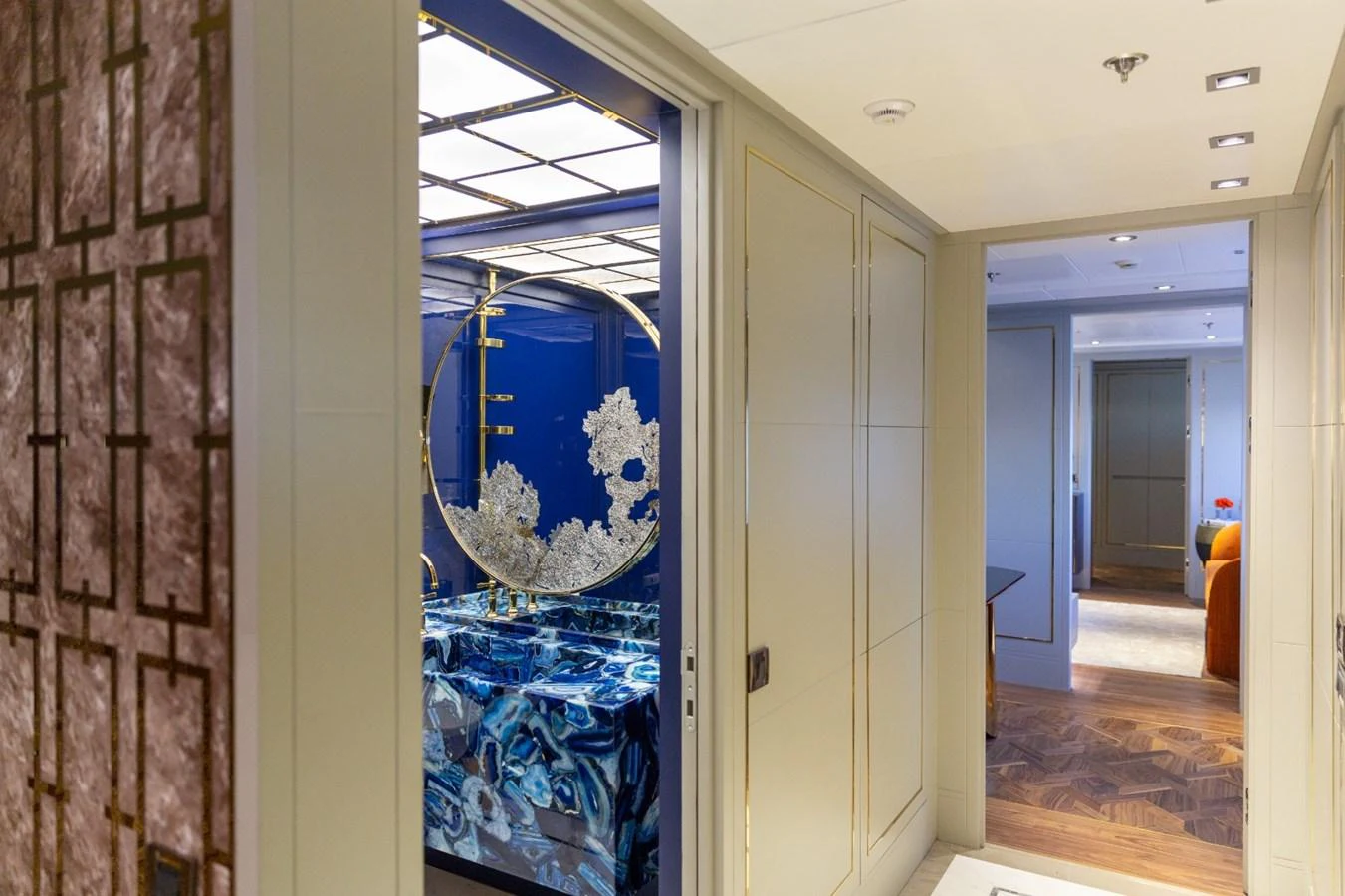 a room with a painting on the wall aboard N.M.N Yacht for Sale