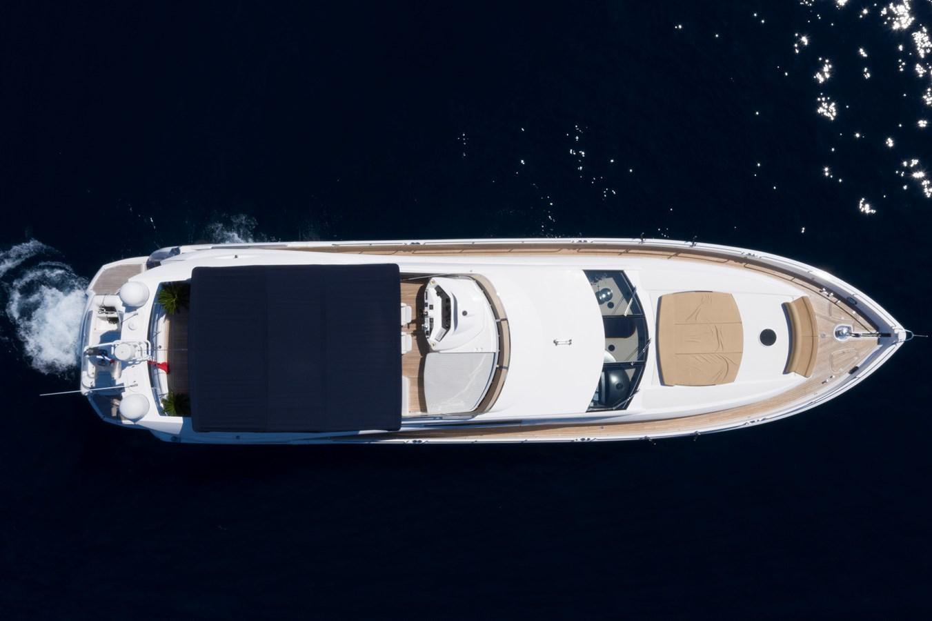 a white car with a black background aboard LADY YOUSRA Yacht for Sale