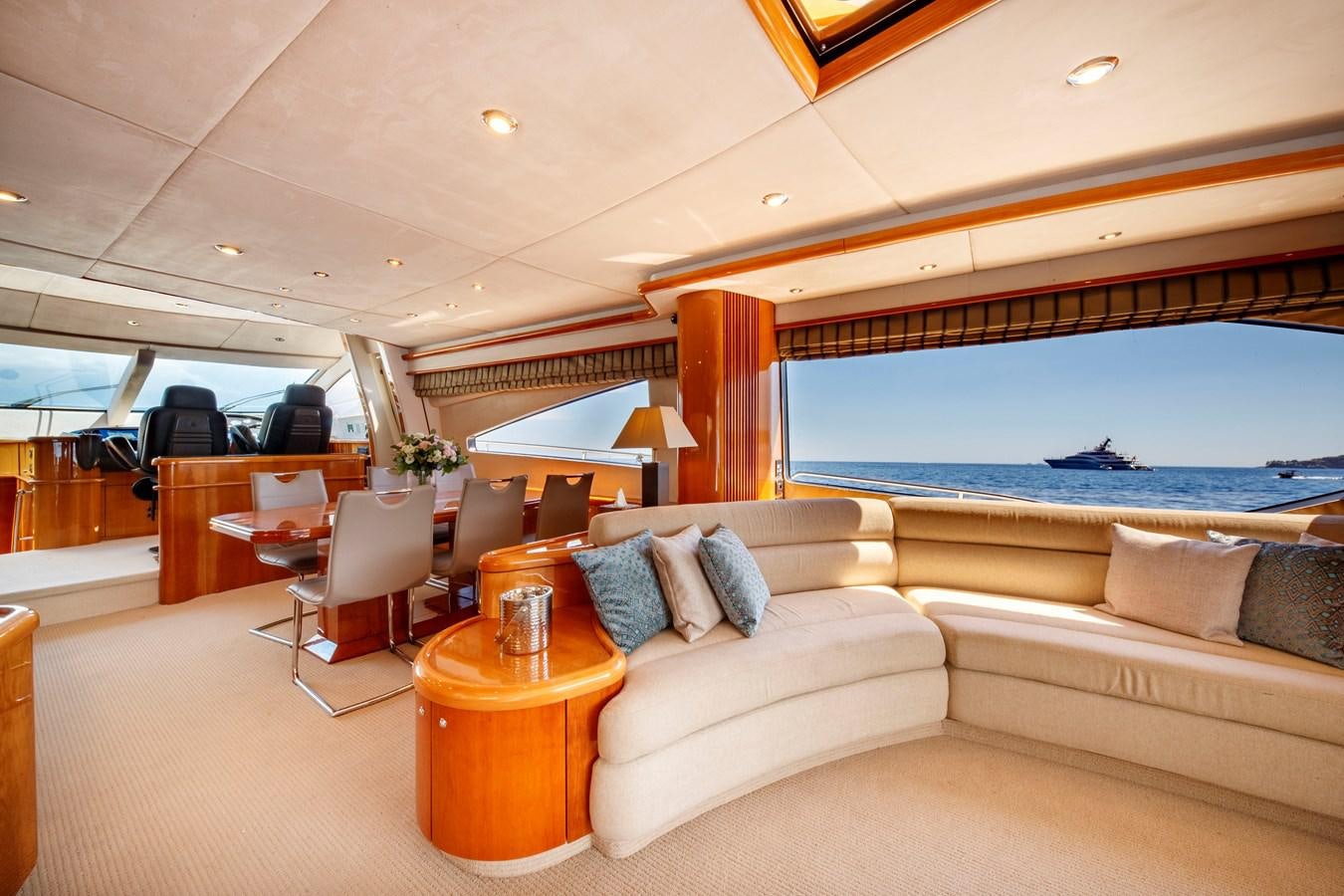 a living room with a large window aboard LADY YOUSRA Yacht for Sale