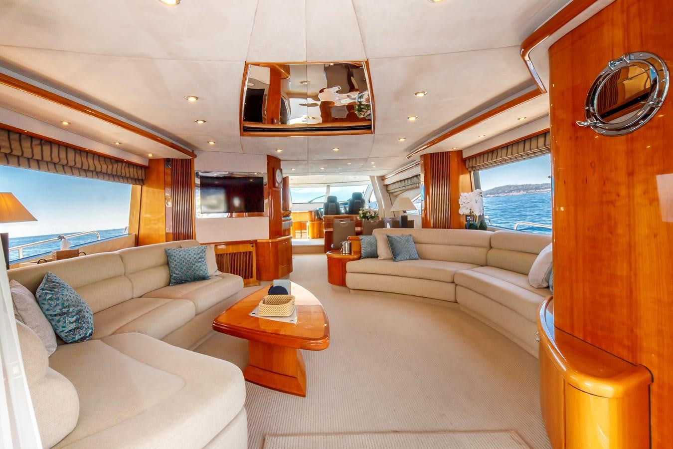 a living room with a large window aboard LADY YOUSRA Yacht for Sale