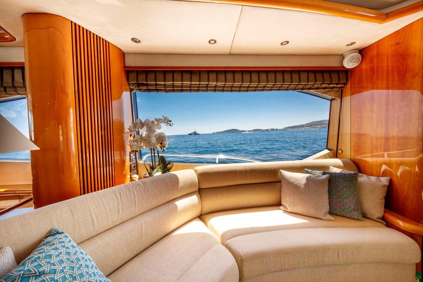 a room with a couch and a window aboard LADY YOUSRA Yacht for Sale