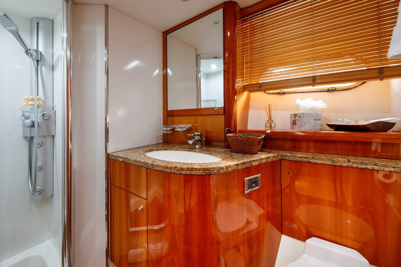 a bathroom with a sink and a mirror aboard LADY YOUSRA Yacht for Sale