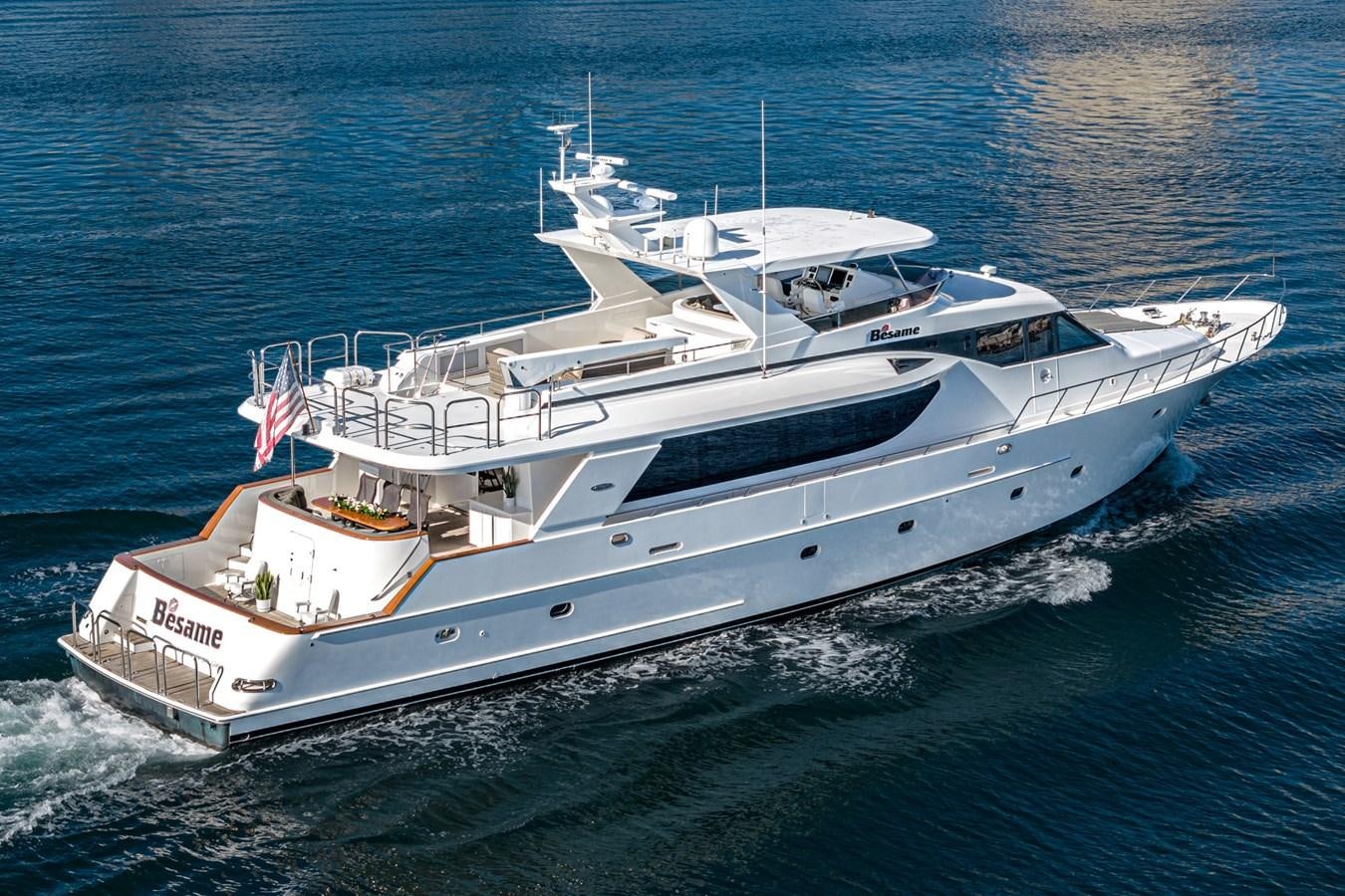 a large white boat aboard BESAME Yacht for Sale