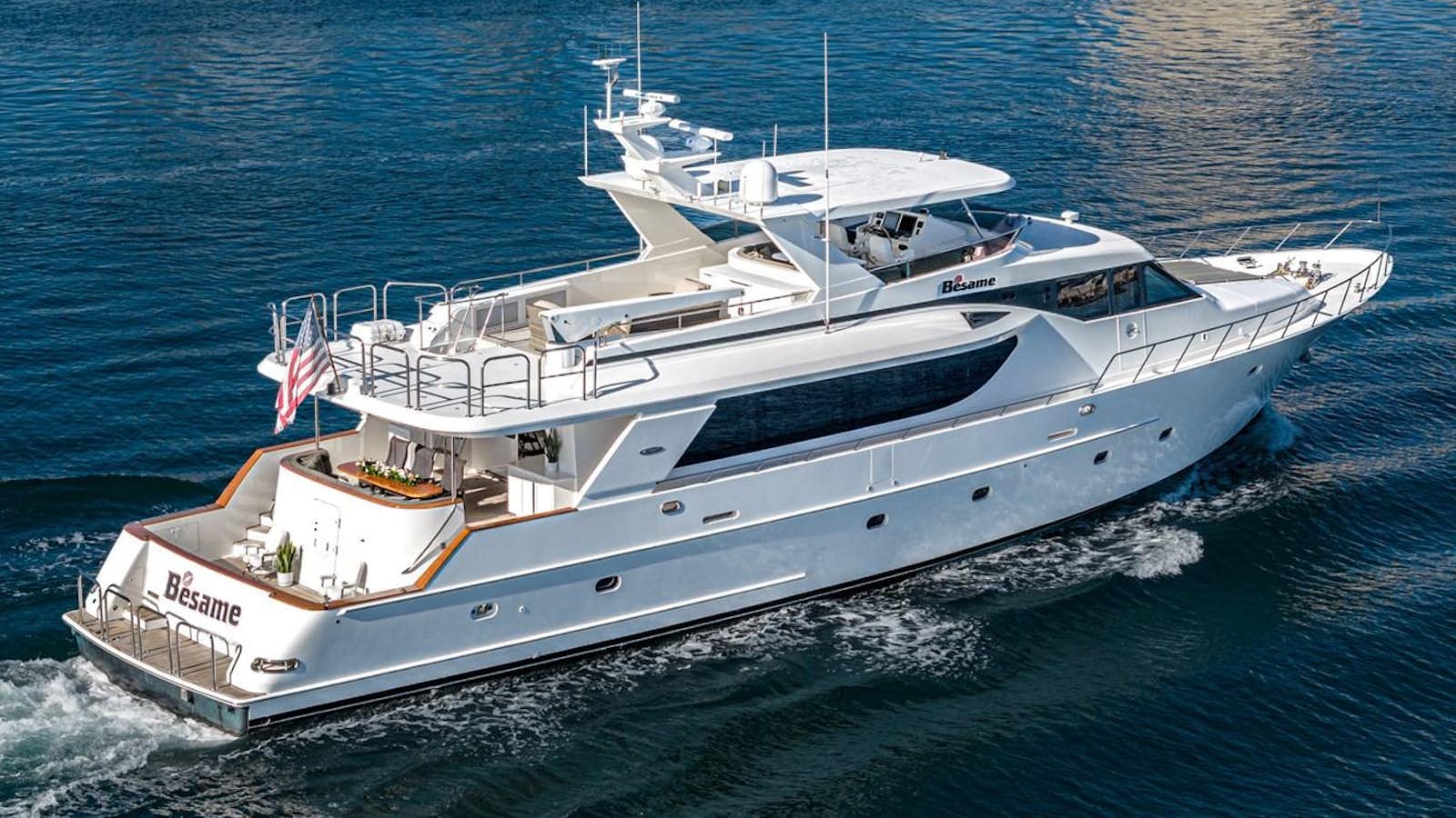 a large white boat aboard BESAME Yacht for Sale