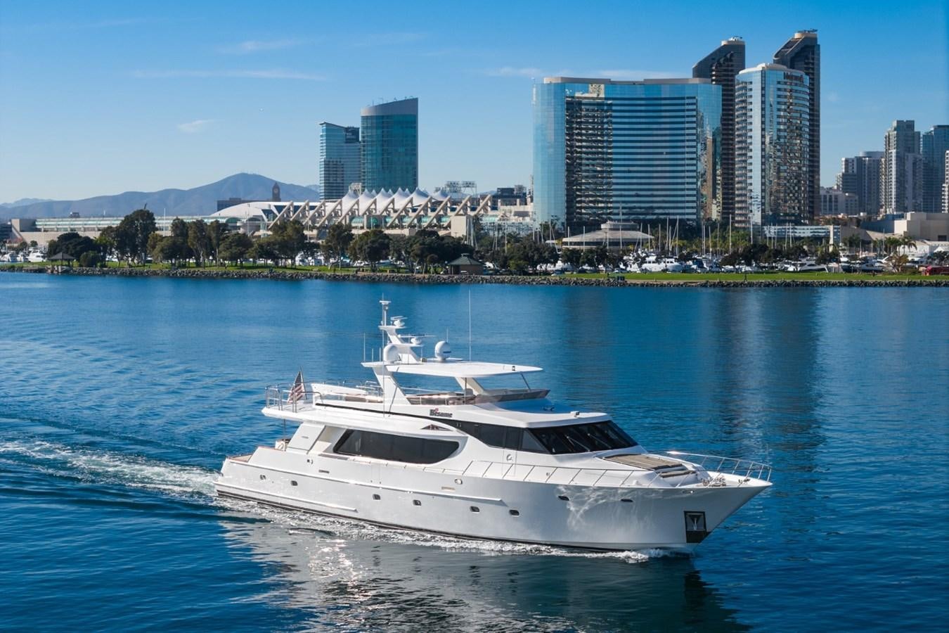 a white yacht on the water aboard BESAME Yacht for Sale