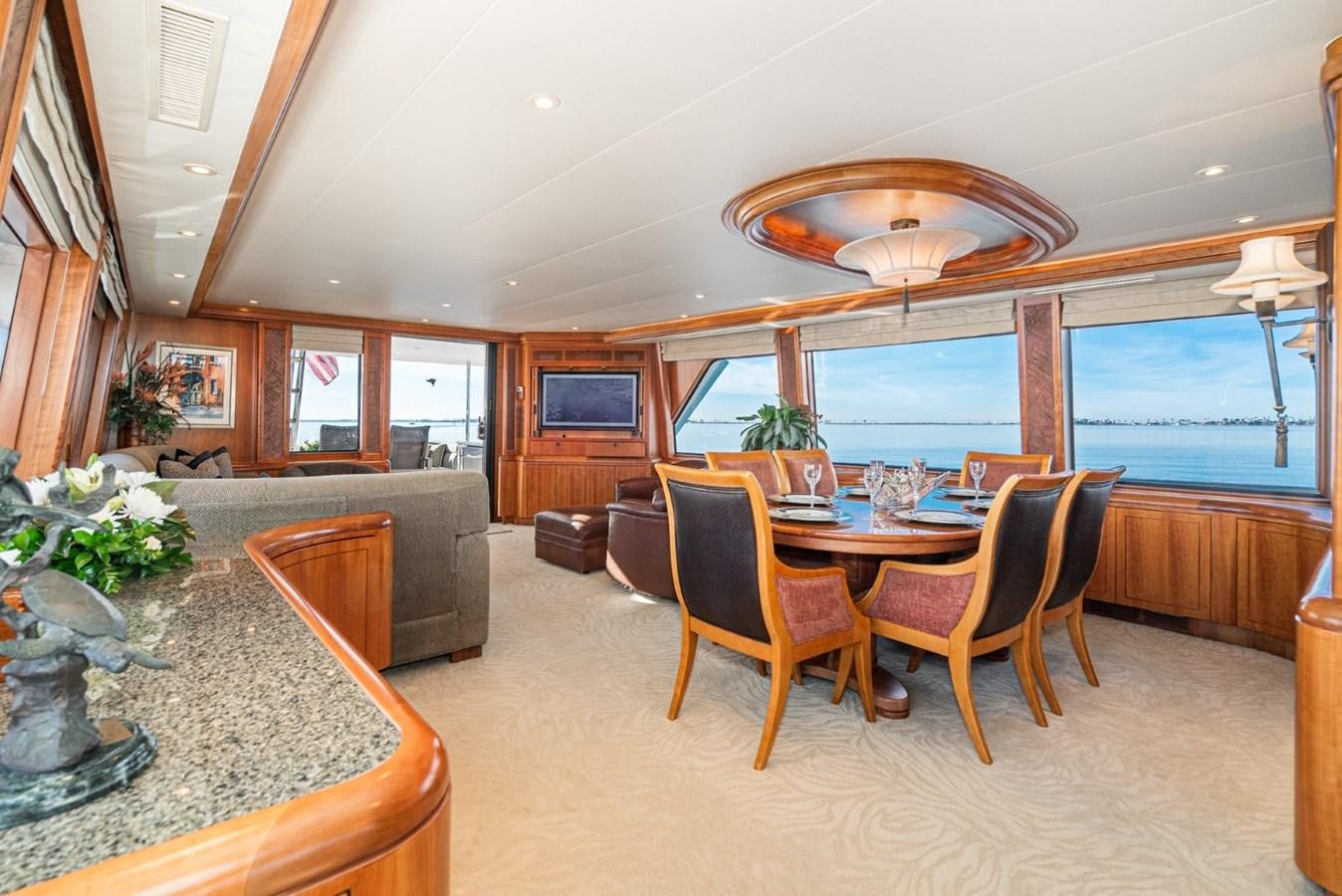 a living room with a large open floor plan aboard BESAME Yacht for Sale