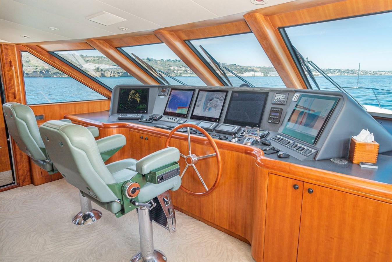 a room with a desk and computers aboard BESAME Yacht for Sale