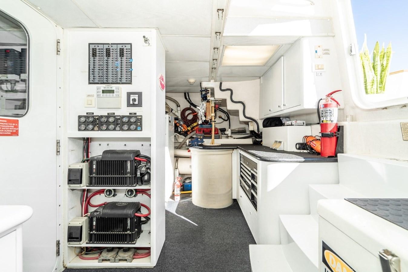 a white machine in a room aboard BESAME Yacht for Sale