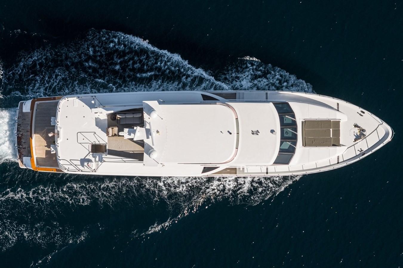 a space shuttle flying over a planet aboard BESAME Yacht for Sale