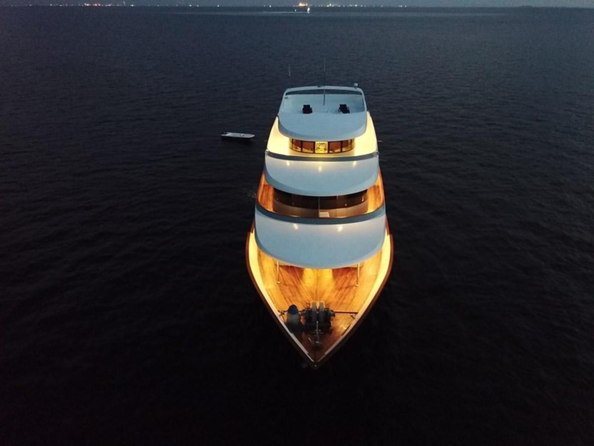 a small boat on the water aboard 2017 SAFARI  142 CUSTOM Yacht for Sale