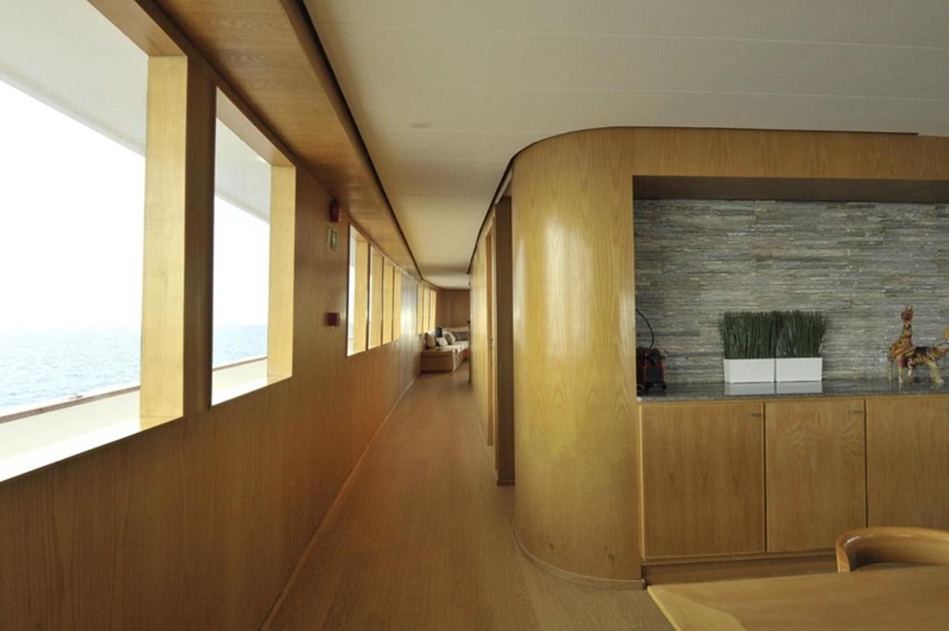 a room with a wood floor and a window aboard 2017 SAFARI  142 CUSTOM Yacht for Sale