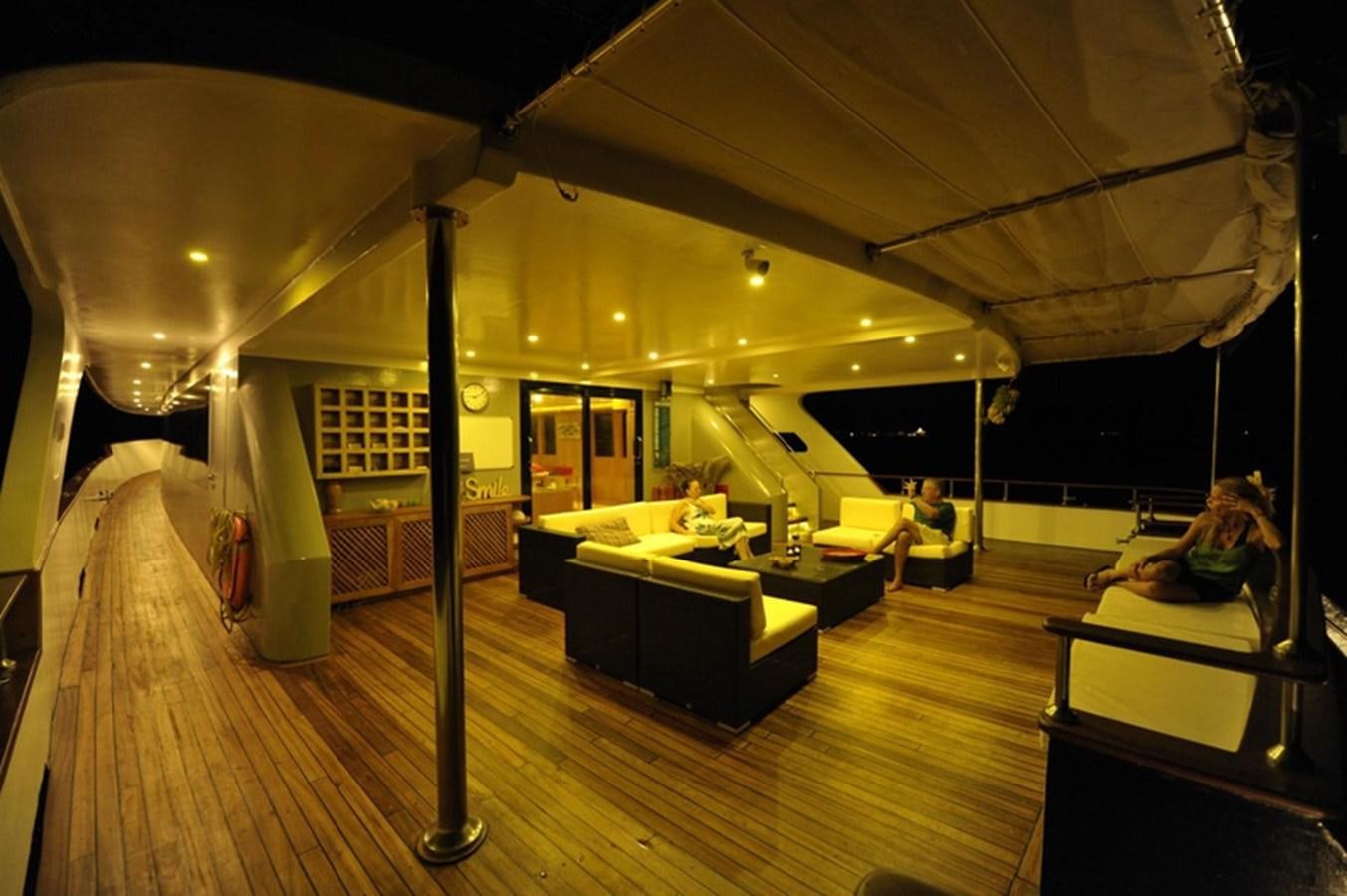 a large room with a wood floor and a large white tent aboard 2017 SAFARI  142 CUSTOM Yacht for Sale