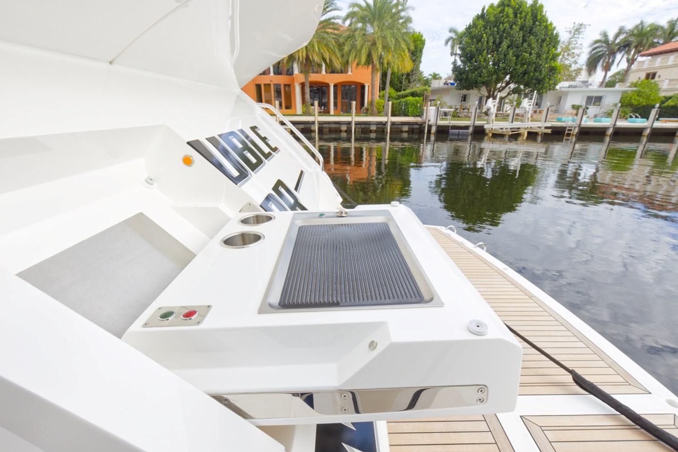 a boat on the water aboard SUNSEEKER 75 SPORT YACHT Yacht for Sale