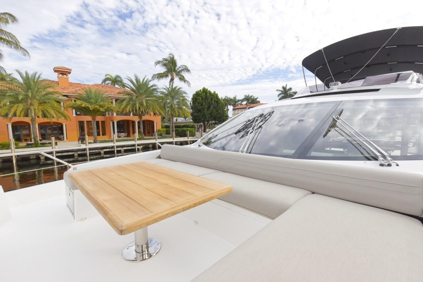 a couple of white boats on a beach aboard SUNSEEKER 75 SPORT YACHT Yacht for Sale