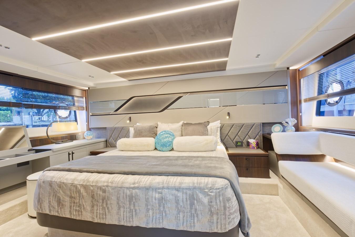 a bedroom with a large bed aboard SUNSEEKER 75 SPORT YACHT Yacht for Sale