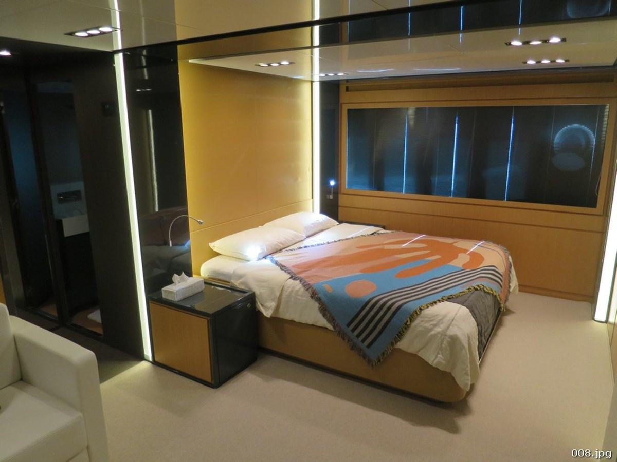 a bed in a room aboard RIVA 86 DOMINO Yacht for Sale