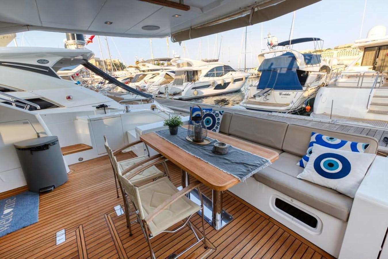 a boat on a deck aboard LANA 1 Yacht for Sale